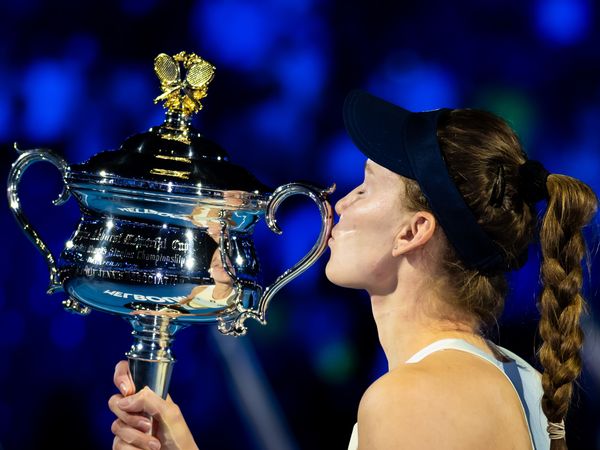 Elena Rybakina post-match trophy celebration
